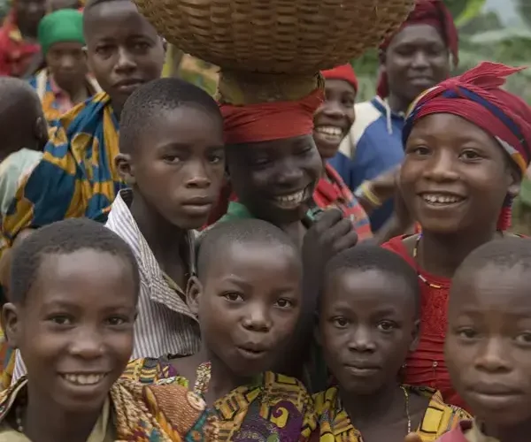 a-group-of-happy-children-with-one-carrying-a-larg-2024-07-11-02-40-27-utc.webp